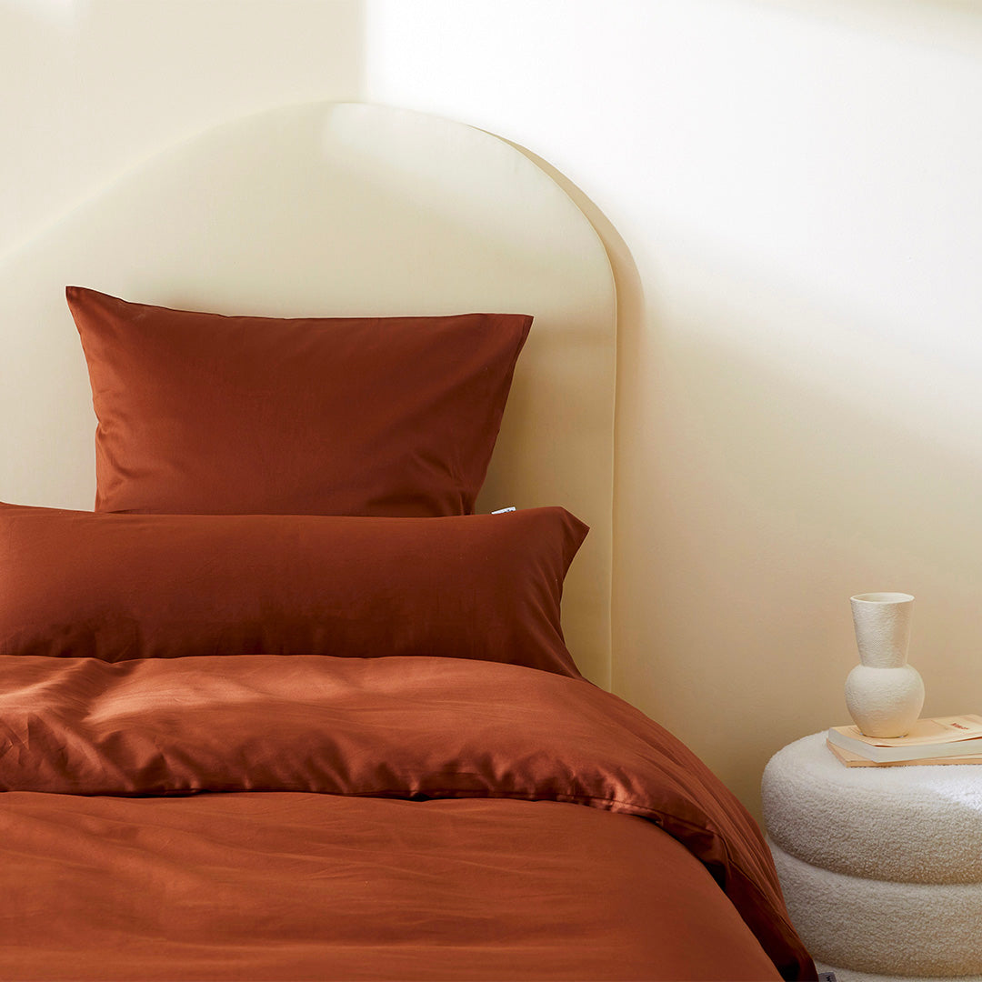La taie de traversin wonderpilo en satin de coton bio - Terracotta